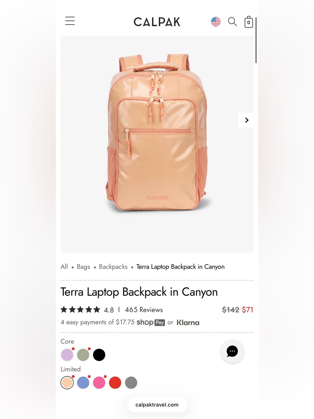 Calpak backpack in canyon peach with coral accents